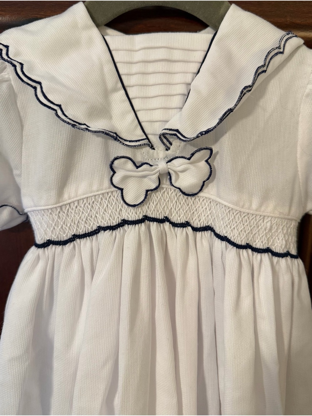 Carriage Boutique White One-Piece with Navy Trim and Bow